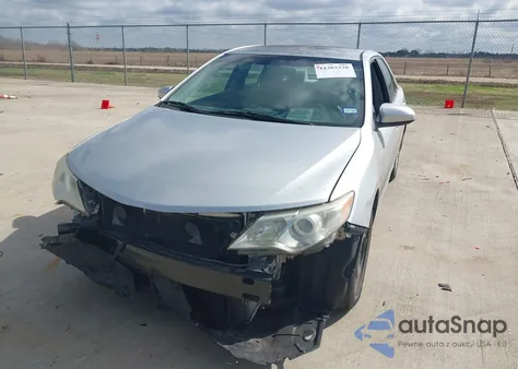 2014 Toyota Camry Le z USA, uszkodzony, nr VIN 4T4BF1FK8ER359992